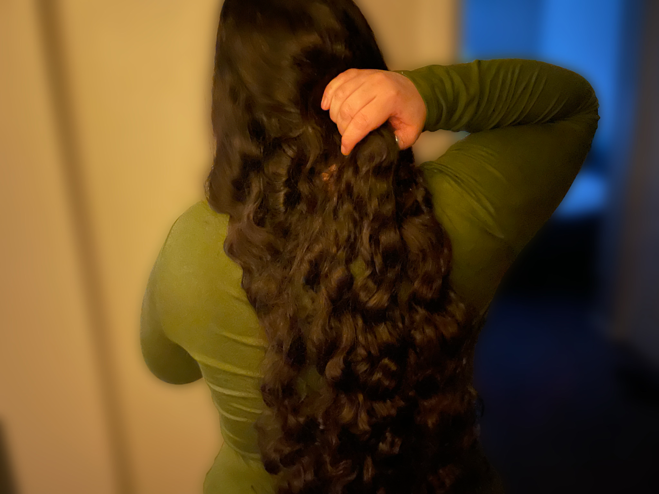 the back of a person with her hair down